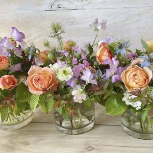 Soft peach and lavender spring vase arrangements